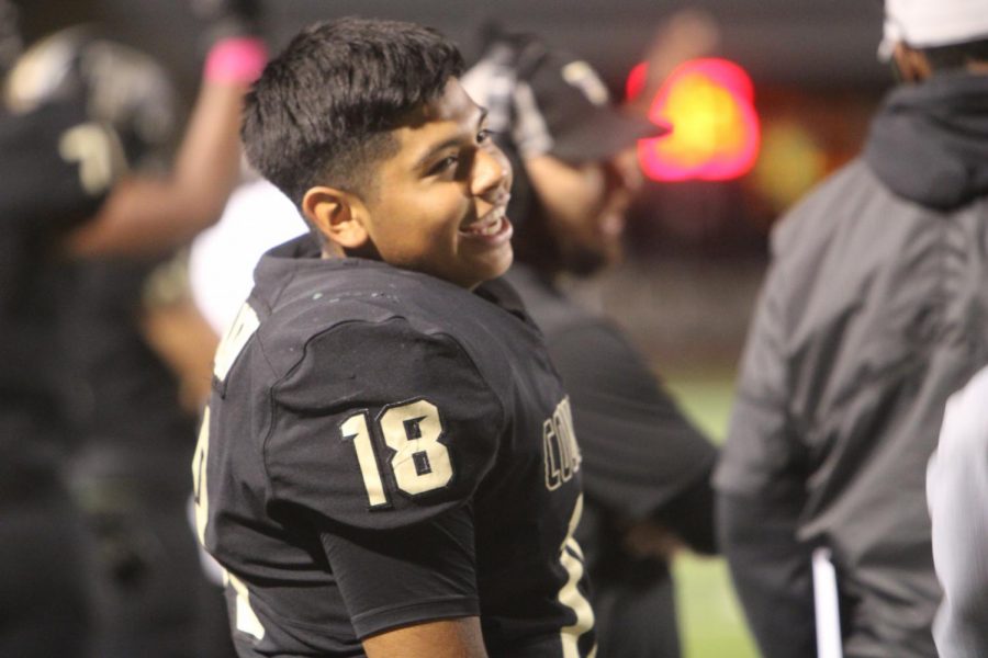 Edwin Lopez smiles at the game against Heritage. 