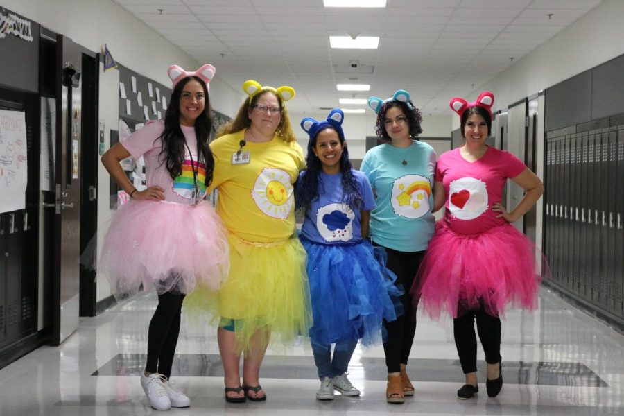 Science teachers dressed as Care Bears for the costume contest. 
