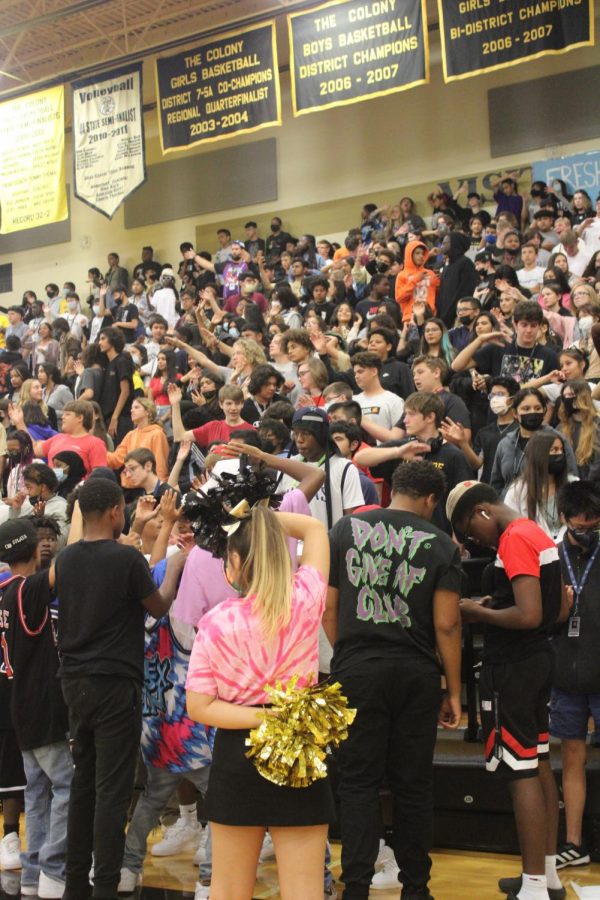 The freshmen student section at the Take the Titans Back in Time themed Pep Rally 