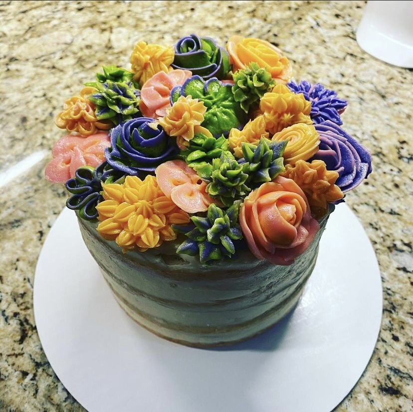 Another of Annas cake creations with flowers and succulents made of icing.