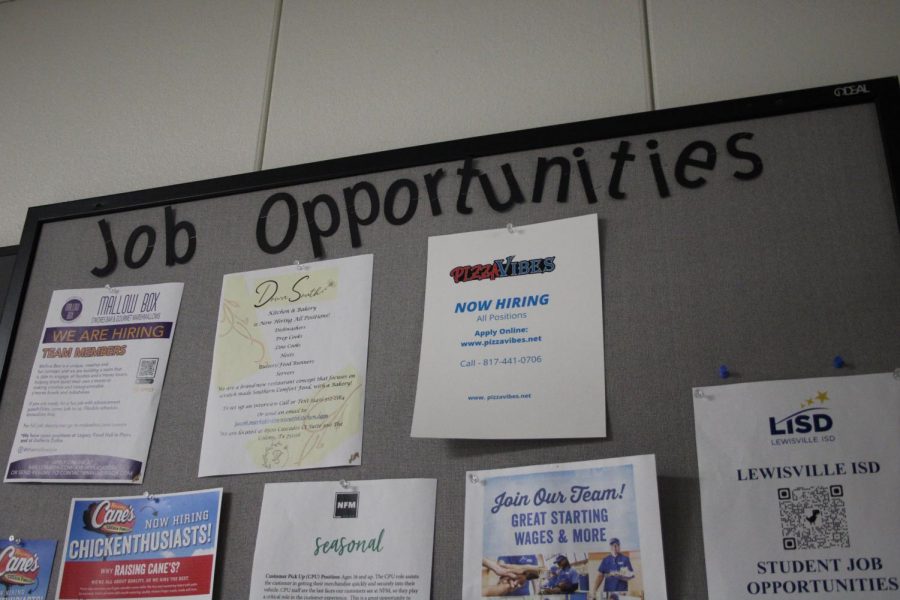 Job posting board in cafeteria advertising more opportunities than usual for high school students due to COVID 19 labor shortages. 