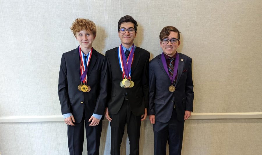 Sophomores Gregory Brashear, Ramy Triki and and Senior Xander Corcoran pose with their Academic Decathlon medals at the state meet where Triki placed fourth overall individually. 