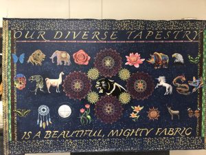 A tapestry representing the different cultures and backgrounds at TCHS, that was displayed during last years' multicultural fair. 