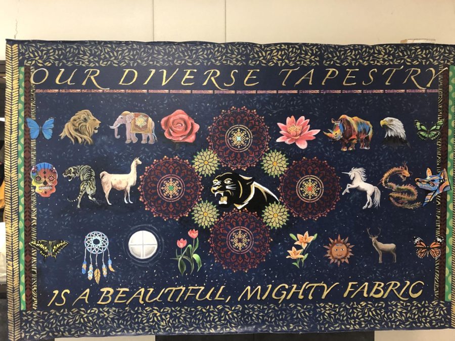 A+tapestry+representing+the+different+cultures+and+backgrounds+at+TCHS%2C+that+was+displayed+during+last+years+multicultural+fair.+